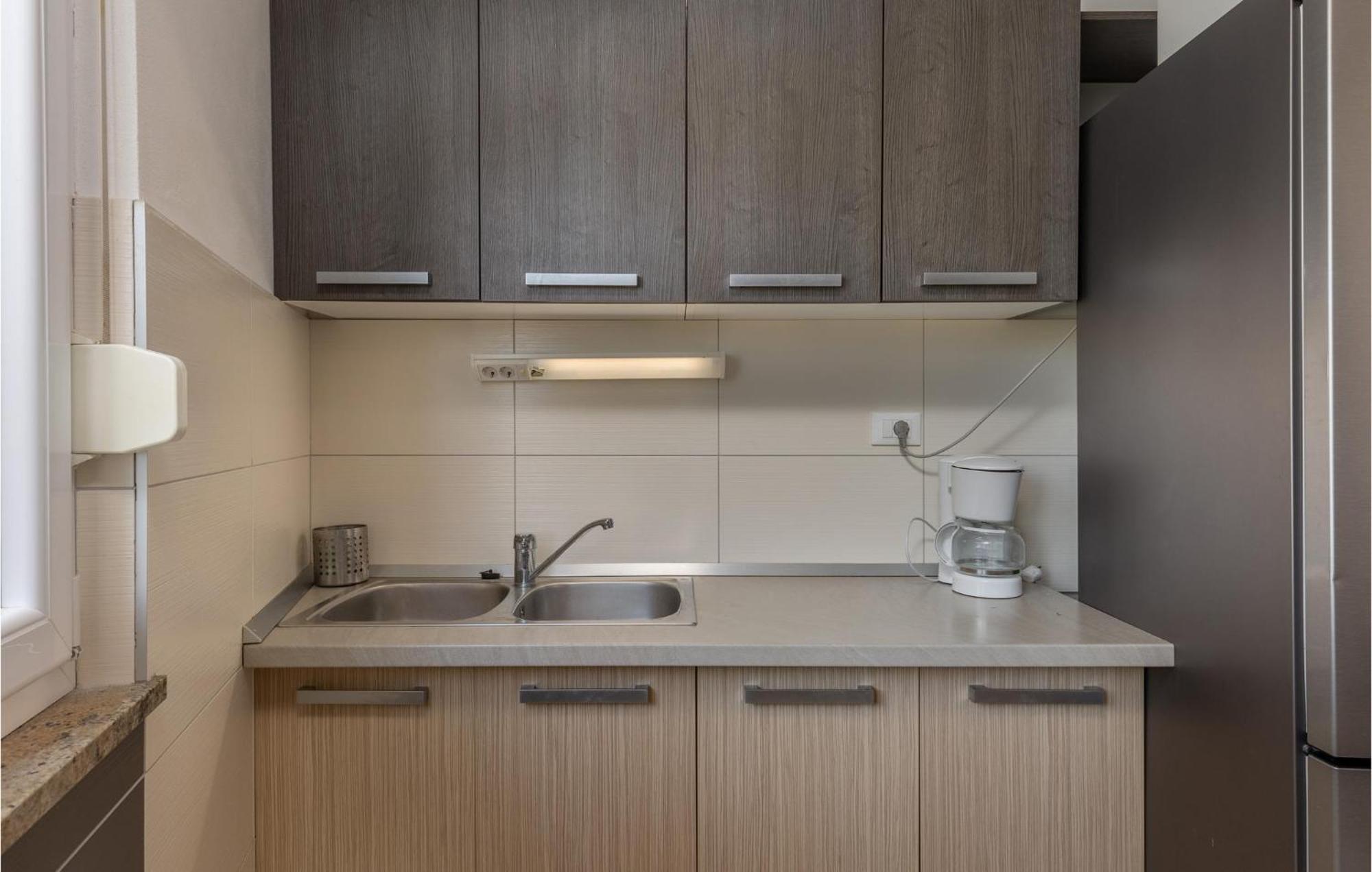 Amazing Apartment In Njivice With Kitchen Exterior photo